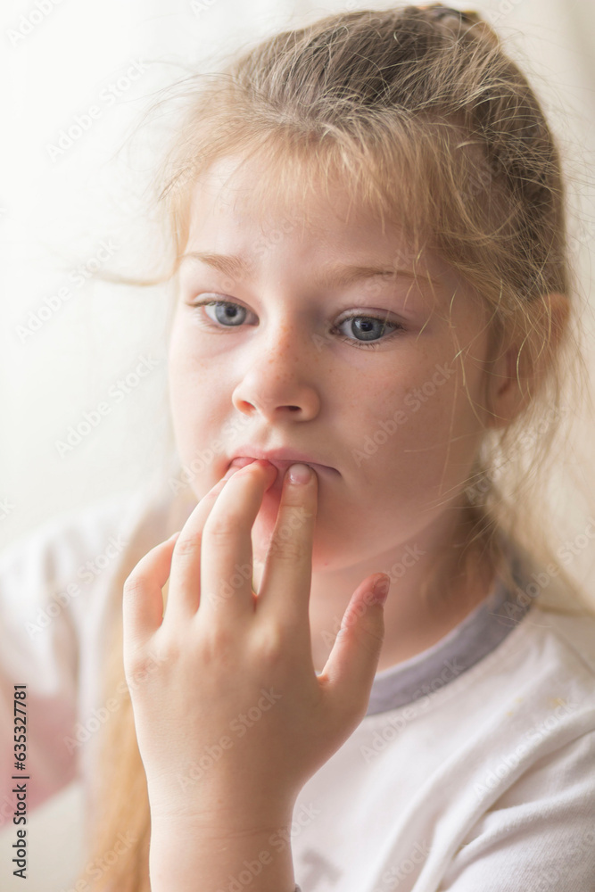 portrait of a beautiful emotional blonde girl in her room portrait of a beautiful emotional blonde girl in her room