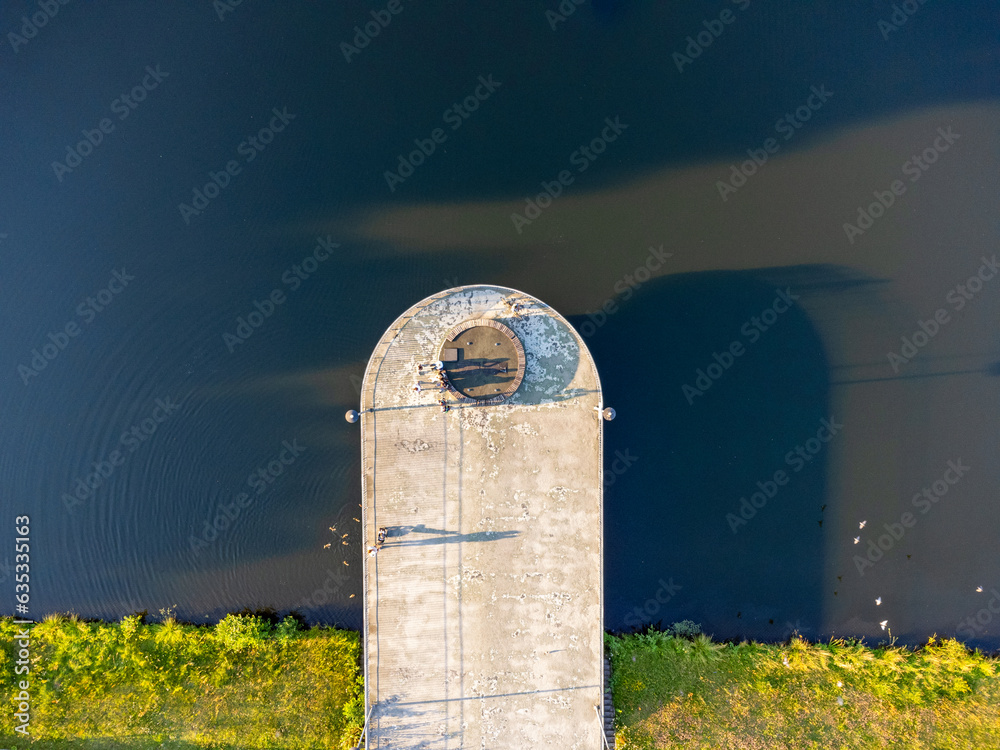 Aerial View from above , concrete platform entering the lake