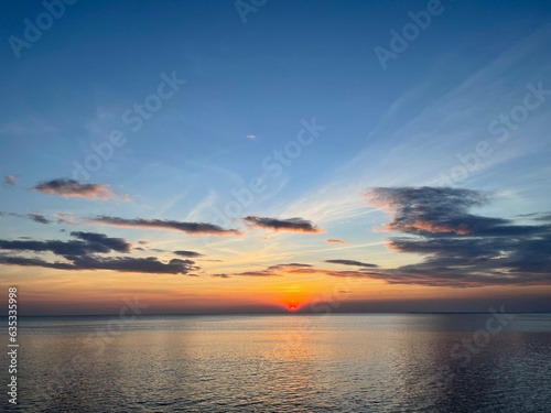 sunset over the sea © Siriwimol