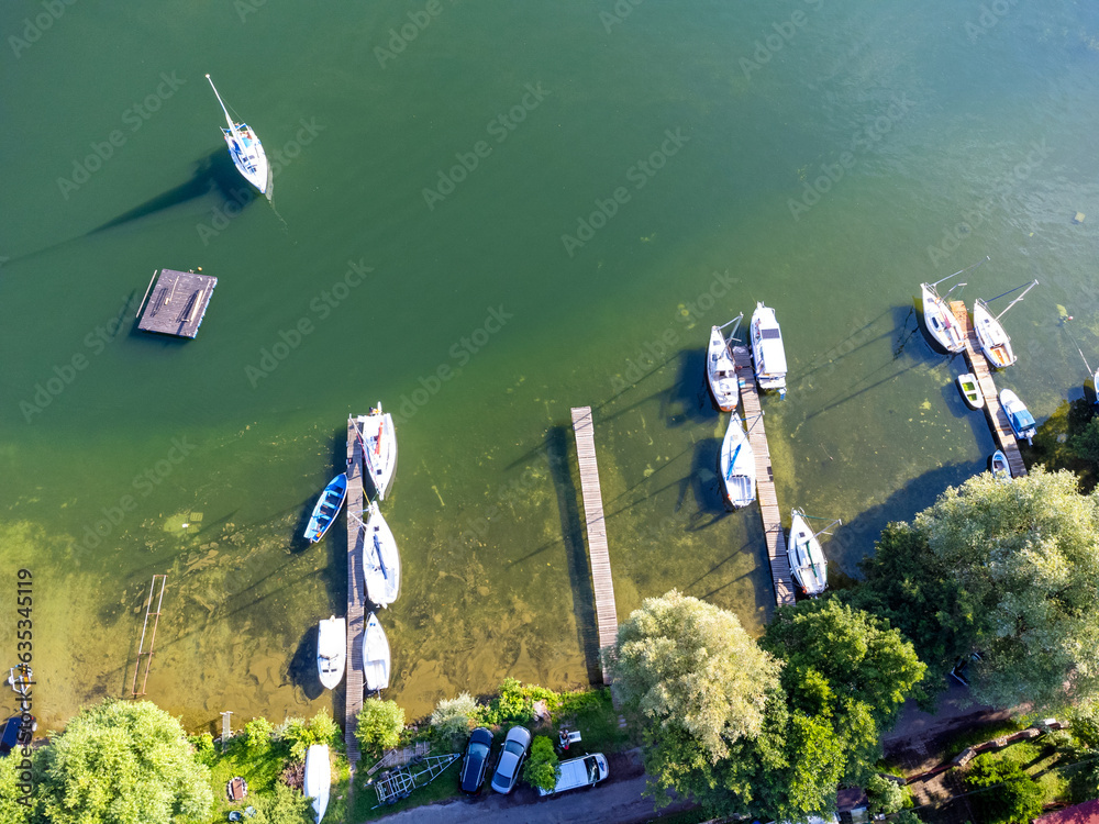 Aerial View from above. Marina for boats and motorboats on the lake, nature.