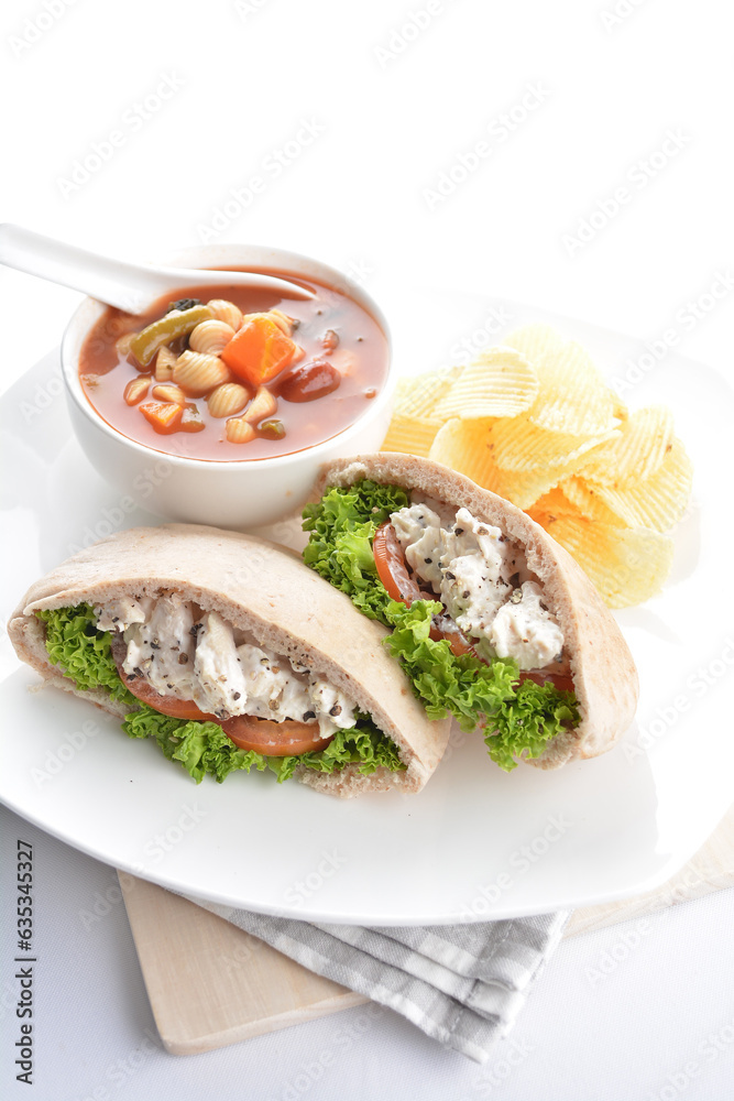 chicken tuna salad kebab open pocket bread with tomato abc soup and crispy potato chips combo healthy set in plate on white background asian halal food cuisine vegan menu for cafe design chicken tuna salad kebab open pocket bread with tomato abc soup and crispy potato chips combo healthy set in plate on white background asian halal food cuisine vegan menu for cafe design