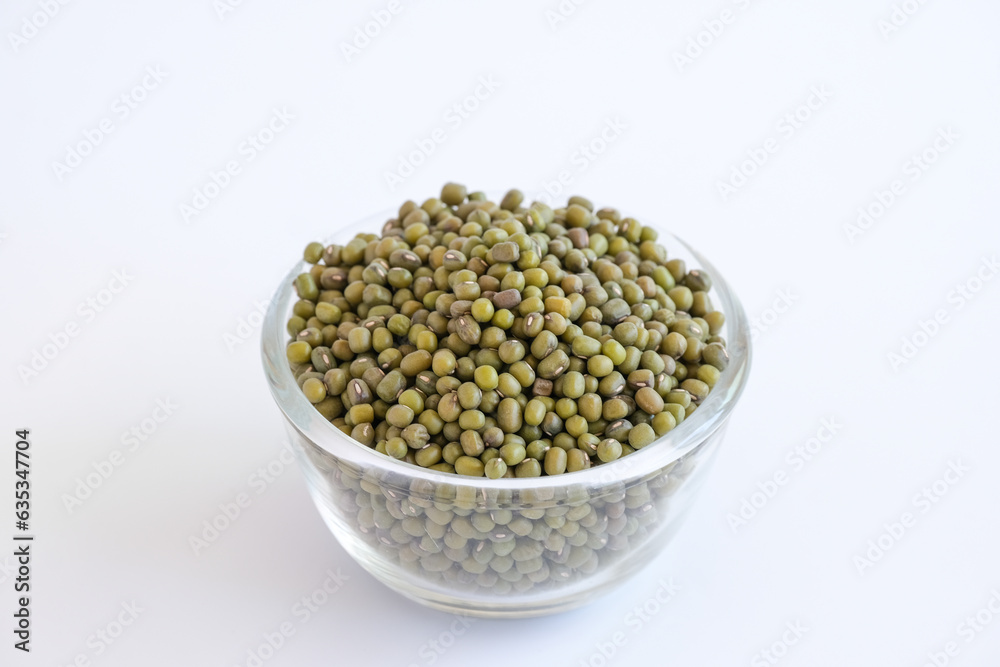The mung bean in glass bowl isolated on white background. The mung bean in glass bowl isolated on white background.