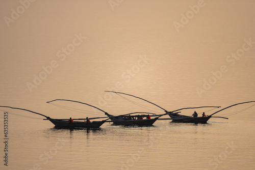 Fishermen in fisherboats at lake Kivu in Ruanda  photo