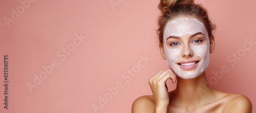 Beautiful Woman With a Facial Mask on Her Face with Copy Space. Beautiful Woman With a Facial Beauty Mask. Spa Procedure. Banner with copy space for text.  photo