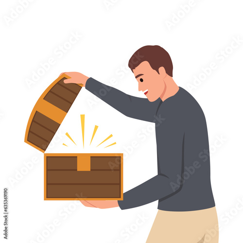 Man with open chest filled with treasures or jewels for concept of lucky find and luck. Delighted guy holds wooden chest with rays of light illuminating face