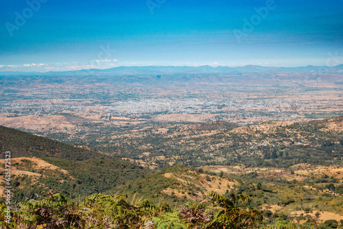 Scenic view of a valley against sky at Mbeya Peak, Tanzania
