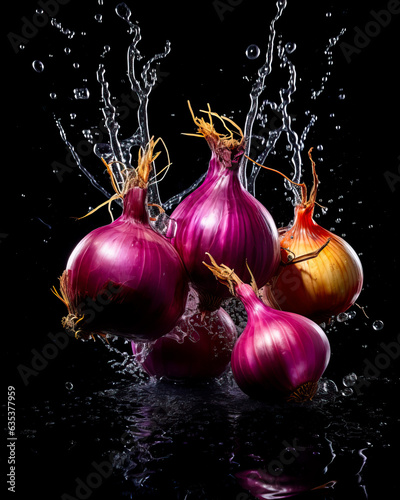 Onions falling with Water splash. Isolated on black background.