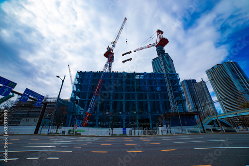 Cranes at the under construction in Tokyo wide shot photo