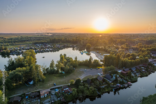 Obraz na płótnie Dolina rzeki Odra. Zachód słońca nad Polderem Buków na Śląsku w Polsce, panorama z lotu ptaka latem. w salonie