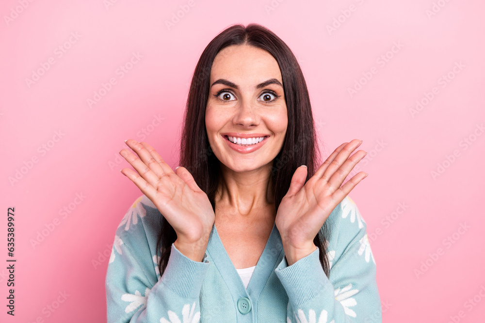 Photo of astonished ecstatic cute woman dressed blue cardigan raising palms up staring at big sale isolated on pink color background Photo of astonished ecstatic cute woman dressed blue cardigan raising palms up staring at big sale isolated on pink color background