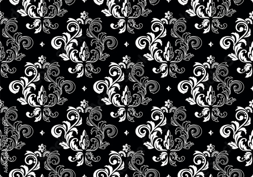 Floral pattern. Vintage wallpaper in the Baroque style. Seamless vector background. White and black ornament for fabric, wallpaper, packaging. Ornate Damask flower ornament