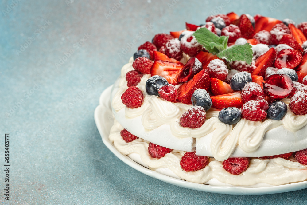 Pavlova dessert with layers of meringue and whipped cream with berries, Long banner format. top view Pavlova dessert with layers of meringue and whipped cream with berries, Long banner format. top view