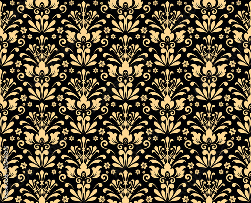 Wallpaper in the style of Baroque. Seamless vector background. Gold and black floral ornament. Graphic pattern for fabric, wallpaper, packaging. Ornate Damask flower ornament