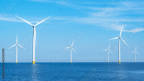 Ocean Wind Farm. Windmill farm in the ocean. Offshore wind turbines in the sea. Wind turbine from aerial view