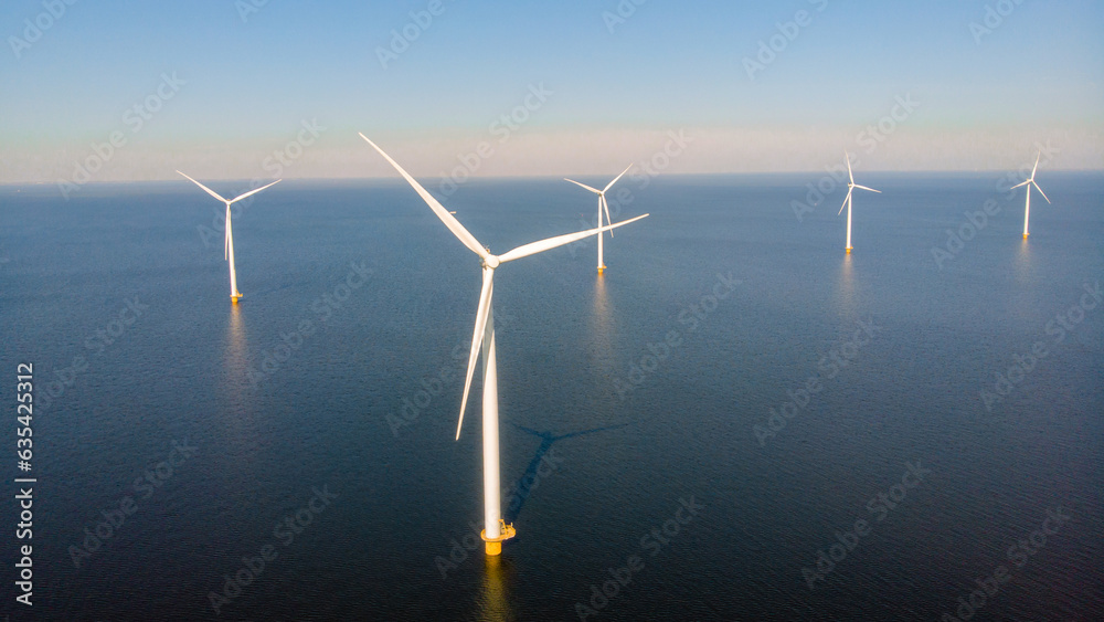 Wind energy in the Netherlands, Sustainable, renewable energy. Wind turbines generate electricity. Windmill farm in the ocean, Green technology. Renewable resource. Sustainable development. Wind energy in the Netherlands, Sustainable, renewable energy. Wind turbines generate electricity. Windmill farm in the ocean, Green technology. Renewable resource. Sustainable development.