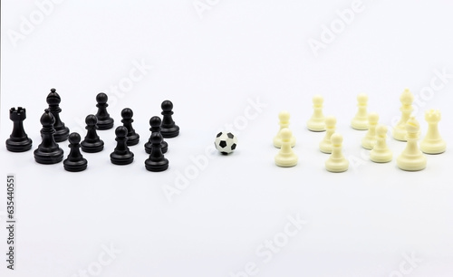 Chess pieces playing a football match