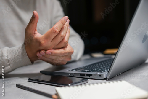 Картината върху платно close up employee man massage on hand palm after hard working to relief pain of