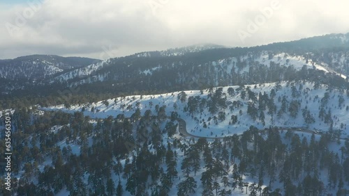 Drone flight over the winter mountains