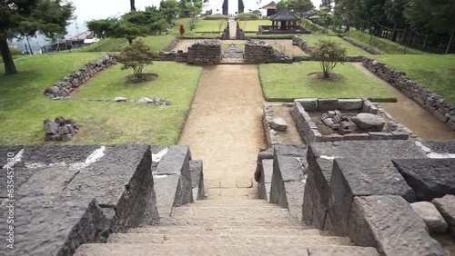 The view of Cetho Temple, an ornament in the shape of a giant tortoise, which is thought to be the symbol of Majapahit, is on the third terrace. photo