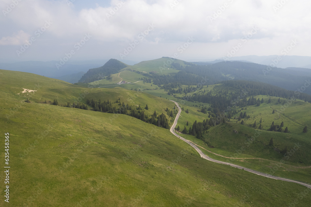 Aerial view above Transbucegi mountain road, in Romania