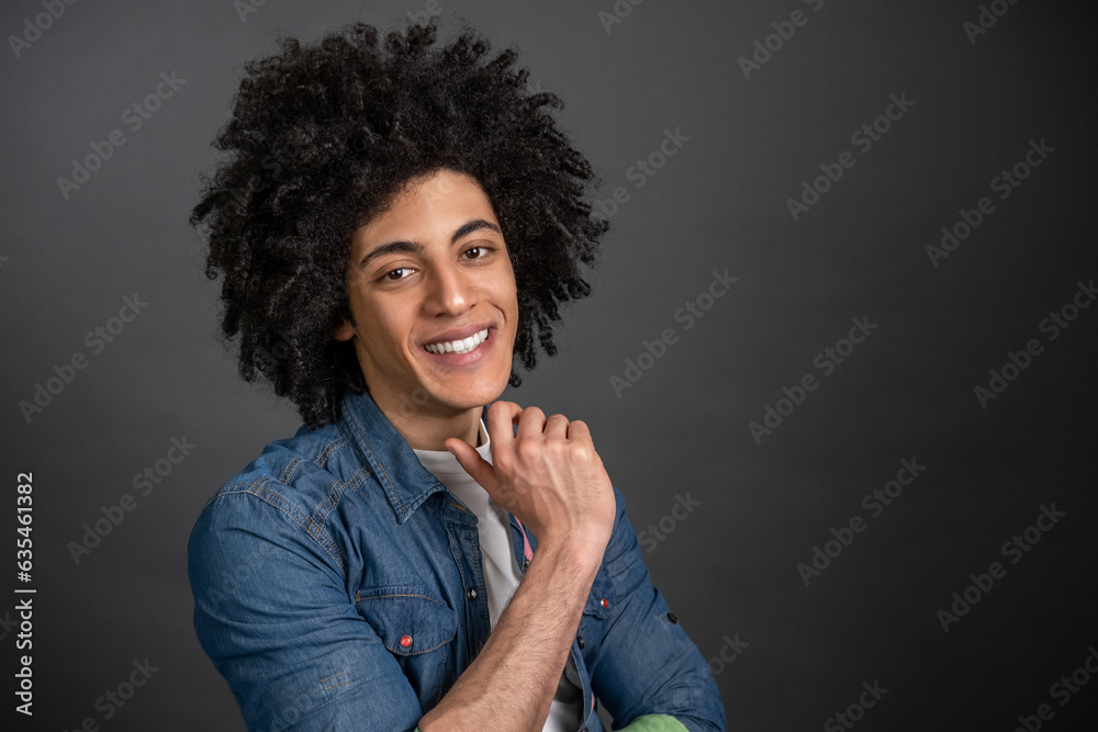 Contented smiling guy looking happy and pleased Contented smiling guy looking happy and pleased