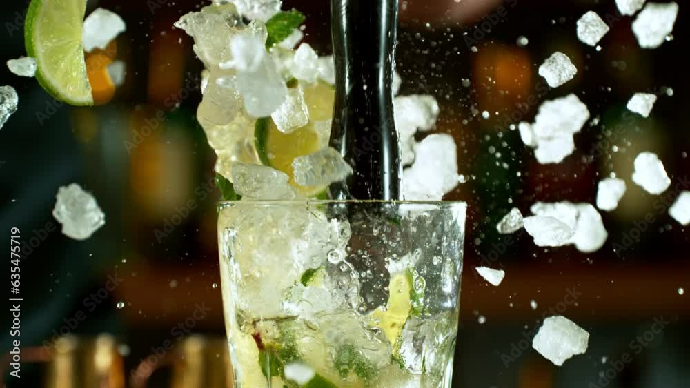Super slow motion of making mojito cocktail with camera movement. Speed ramp effect. Filmed on high speed cinema camera with cinebot, 1000 fps.