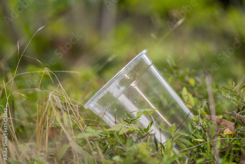 Plastic Glass in the Grass. 