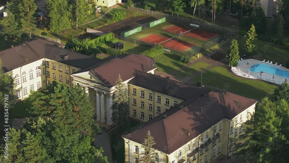 Aerial view of Lithuanian resort Druskininkai. Panoramic view of Lithuanian resort Druskininkai church in city park. A spa town on the Nemunas river Aerial view of Lithuanian resort Druskininkai. Panoramic view of Lithuanian resort Druskininkai church in city park. A spa town on the Nemunas river