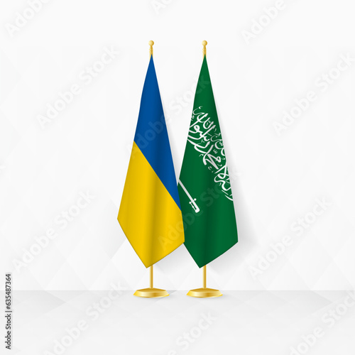 Ukraine and Saudi Arabia flags on flag stand, illustration for diplomacy and other meeting between Ukraine and Saudi Arabia.