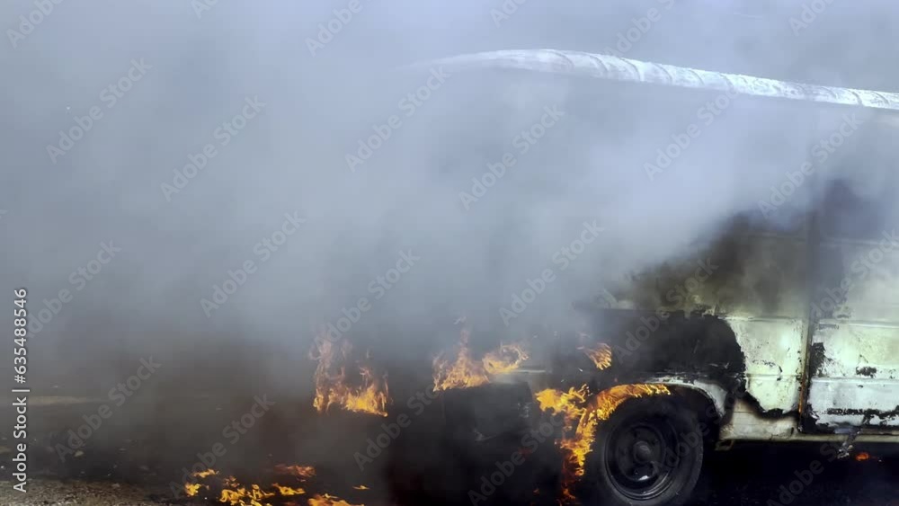 Fire on the street. The car is on fire. In the afternoon, a car caught ...