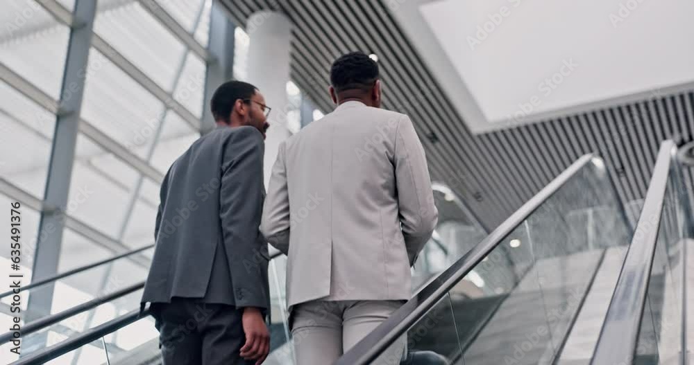 Escalator, business men and conversation in a airport lobby with travel and work commute. Communication, employees speaking and conversation about web analyst project with discussion on stairs