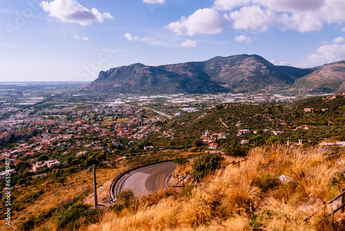 View from the top of the city of Terracina in Italy and the Mediterranean coast. Beautiful landscape with views of the valley and mountains. photo