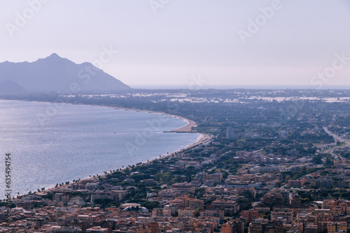 Panoramic sea landscape with Terracina, Lazio, Italy. Scenic resort town village with nice sand beach and clear blue water. Famous tourist destination in Riviera de Ulisse © Alesia