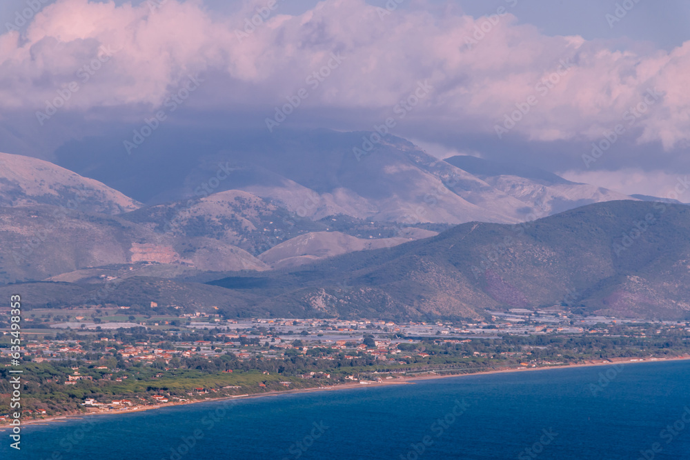 Aerial sunset view to Sperlonga coast form Sunset view from Remains Of Temple Of Jupiter Anxur in Terracina, Italy. Aerial sunset view to Sperlonga coast form Sunset view from Remains Of Temple Of Jupiter Anxur in Terracina, Italy.
