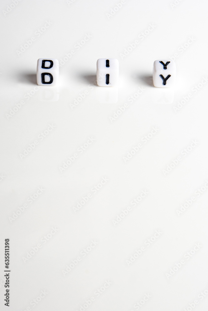 diy word or concept made by white letter cubes on white and gray background, do it yourself abbreviation diy word or concept made by white letter cubes on white and gray background, do it yourself abbreviation