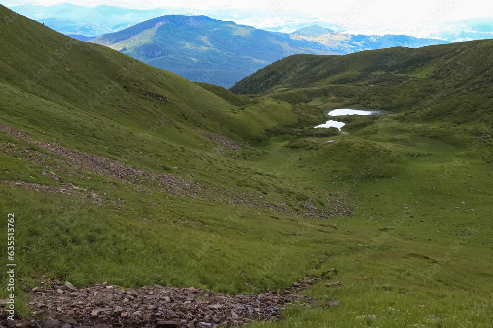 Naklejka premium landscape with lake in the mountains