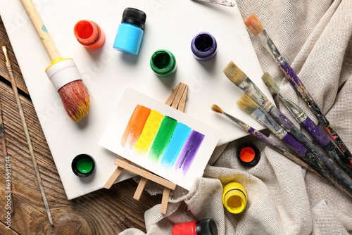 Canvas with brushes, paints...