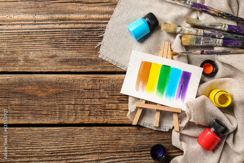 Mini easel with paints, bru...