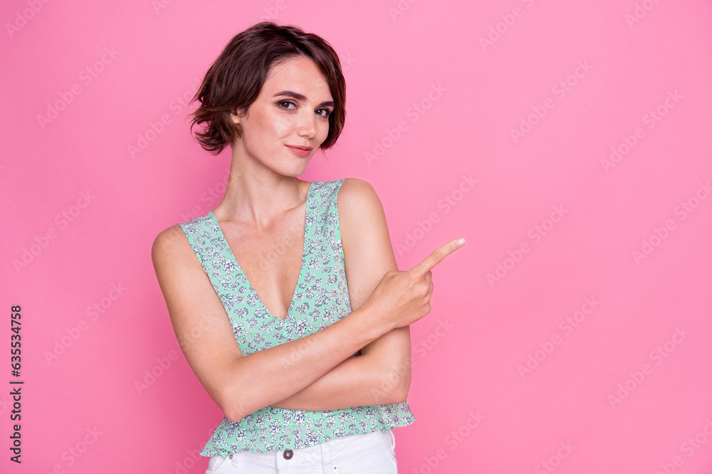 Photo of glamorous young charming girl wear nice outfit direct finger empty space makeup up artist salon isolated on pink color background Photo of glamorous young charming girl wear nice outfit direct finger empty space makeup up artist salon isolated on pink color background