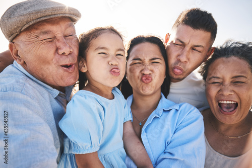 Funny, selfie and child with grandparents and parents in nature on a vacation, adventure or holiday. Comic, goofy and family generations taking a picture with silly faces by a sky on a weekend trip.