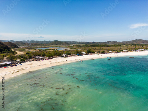 Lombok, Indonesia, Beach ocean drone aerial view landscape at Tanjung Ann beach area. Lombok is an island in West Nusa Tenggara province, Indonesia.
