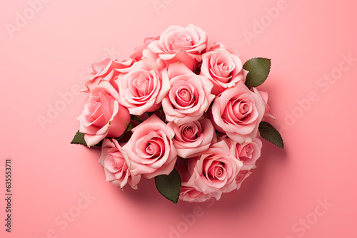 Beautiful rose roses bouquet on rose background. Top view
