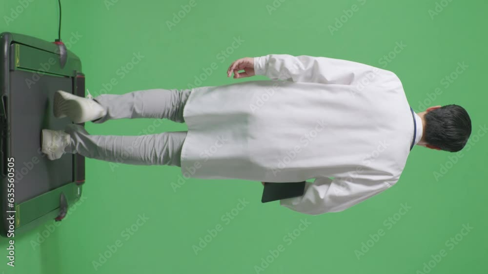 Full Body Of Back View Asian Male Doctor With Stethoscope Holding A Tablet While Walking On Green Screen Background In The Hospital
Full Body Of Back View Asian Male Doctor With Stethoscope Holding A Tablet While Walking On Green Screen Background In The Hospital