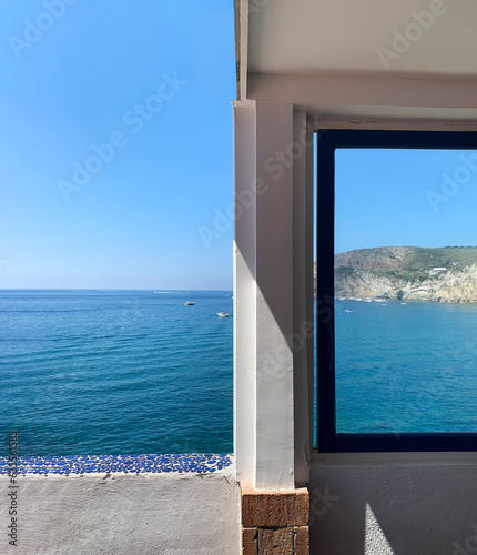 open window with fabulous views of the beach  ocean and sky. Dream piece  view from the restaurant  delicious food and a beautiful view