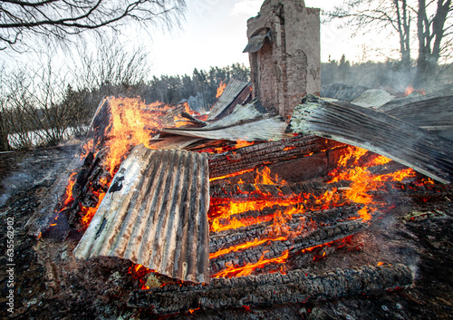 House on fire, heat, firemen, ash, smoke photo