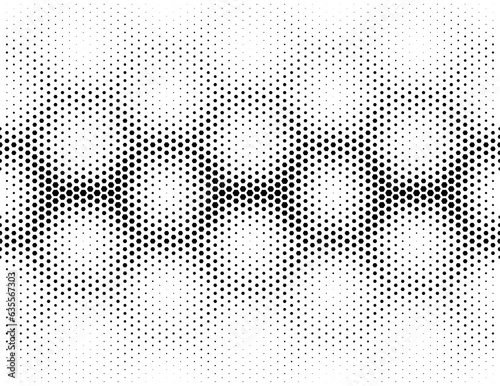 Disappearing seamless halftone vector background. Filled with black hexagones