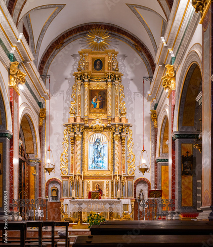 Leinwand Poster Altar and altarpiece inside a Catholic church.
