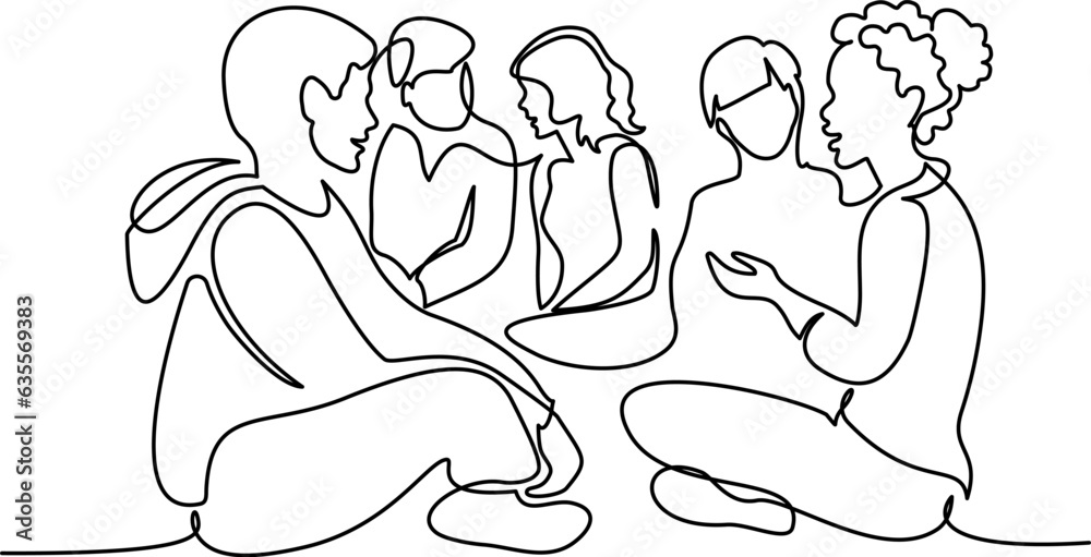 Group of people different nations and ages sitting on ground together Group of people different nations and ages sitting on ground together