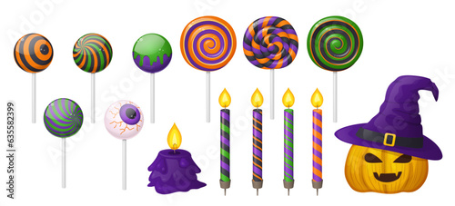 Halloween candies, lollipops, candles and pumpkin