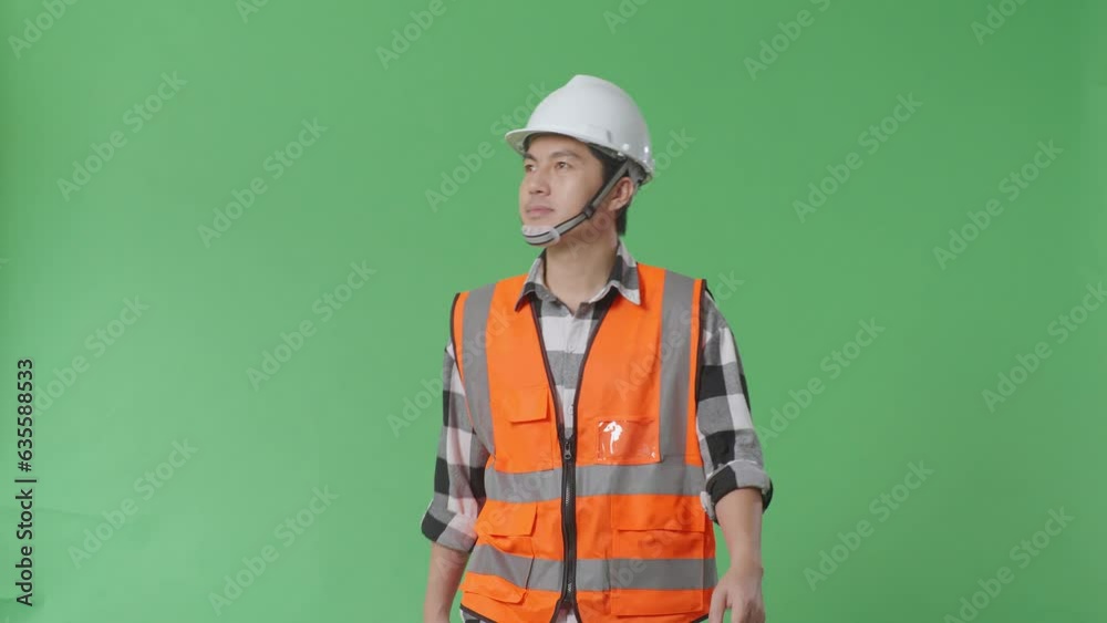 Asian Male Engineer With Safety Helmet Looking Around While Walking In The Green Screen Background Studio
Asian Male Engineer With Safety Helmet Looking Around While Walking In The Green Screen Background Studio